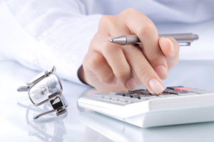 Close up of Female Making Calculations